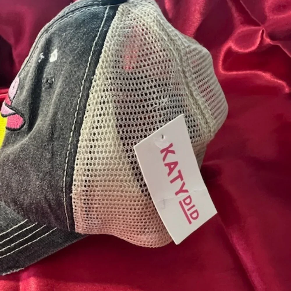 Cowboy Hat Happy Face Trucker Hat from the brand Katydid. Yellow smiley face